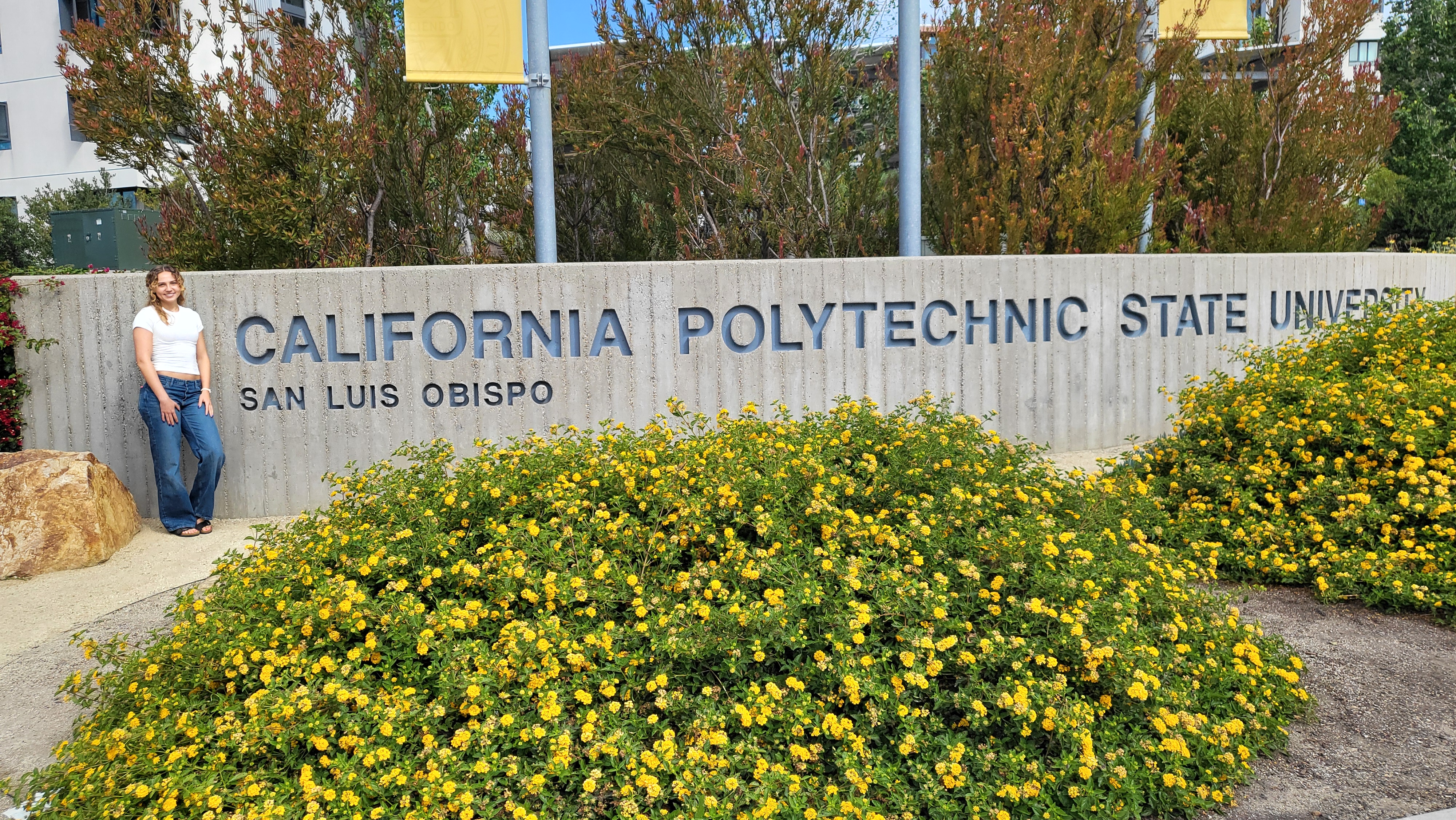 Clarice at Cal Poly SLO sign